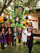 Load image into Gallery viewer, Frankenstein pinata at an outdoor Halloween party

